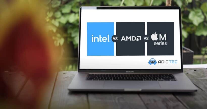 Portátil en una mesa de madera mostrando una comparativa de procesadores para portátil Intel vs AMD vs Apple M series.