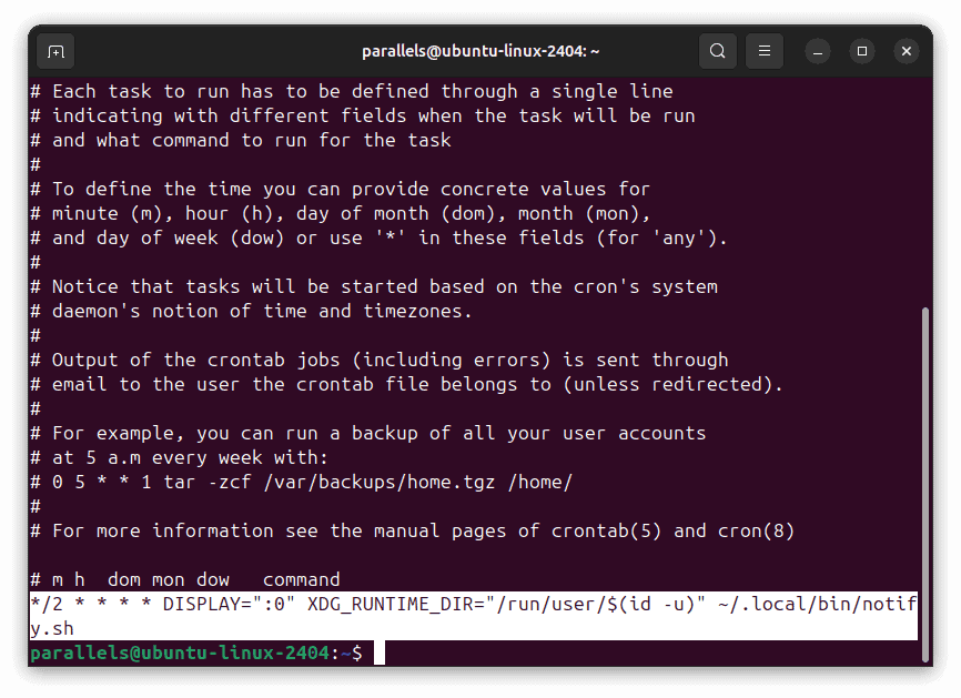 Captura de pantalla mostrando el contenido de un archivo crontab en un editor de texto.