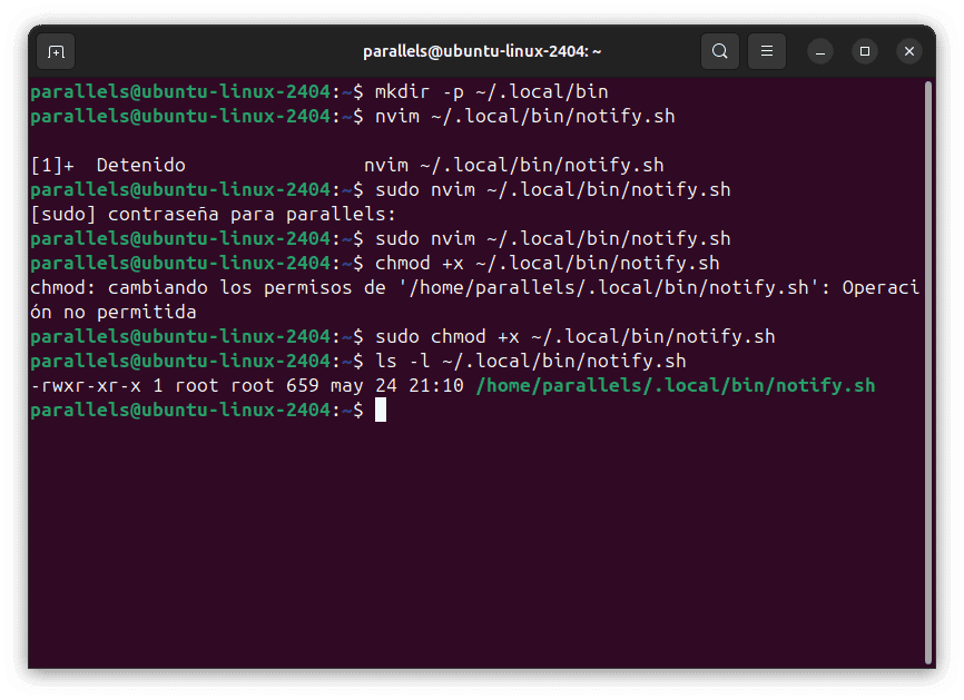 Se muestra la verificación de los permisos utilizando ls -l.
