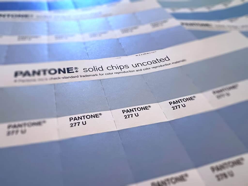 Pantone color guide pages focusing on a range of blue tones.