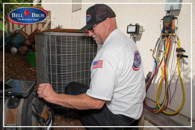 A Bell Brothers technician—background-checked and uniformed—carefully services an outdoor air conditioning unit with professional tools and diagnostic equipment. Our trusted team is known throughout Northern California for honest, upfront pricing and our No Surprise Guarantee, ensuring reliable service you can count on, every time.