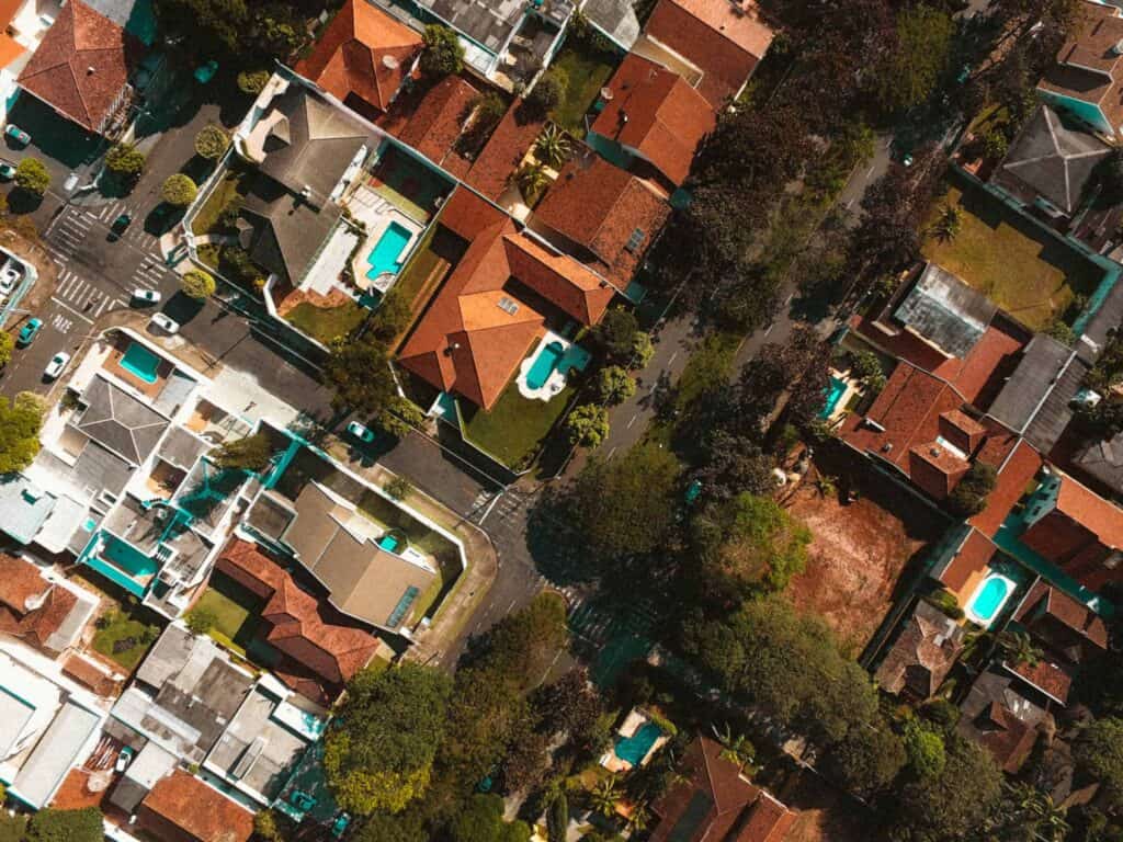 Aerial view of a vibrant Northern California neighborhood, showcasing tree-lined streets and homes with inviting backyards. Bell Brothers—trusted by local communities for our No Surprise Guarantee—proudly serves these areas with background-checked technicians, honest upfront pricing, and a long-standing reputation for reliable service.