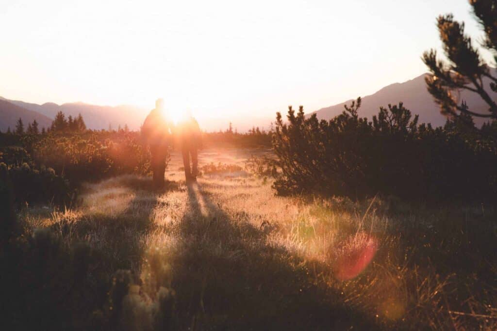 Two people stand in a sunny, open field with long shadows stretching behind them—a warm scene reminiscent of Northern California’s welcoming communities. At Bell Brothers, our background-checked technicians bring the same peace of mind to your home service experience. We’re proud to offer upfront pricing and our signature No Surprise Guarantee, so you always know what to expect from a trusted team serving neighborhoods across Northern California.