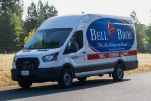 A trusted Bell Brothers van, branded for HVAC, plumbing, and sewer, showcases our No Surprise Guarantee and expert local care.