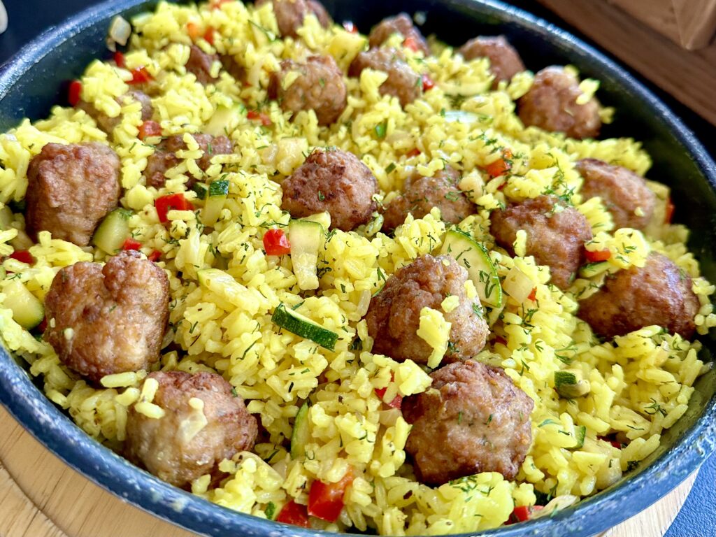 Kremowe risotto z klopsikami i cukinią