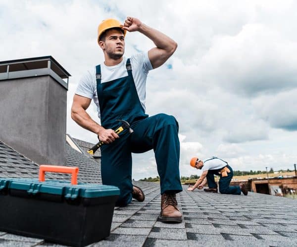 selective focus of handsome handyman touching helm resize.jpg