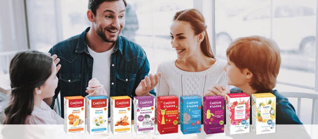 A happy family enjoys rooibos tea together