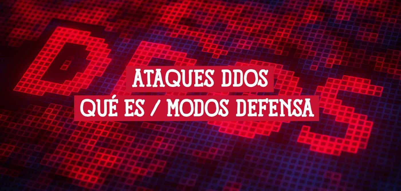 Representación digital de "Ataques DDoS: Qué es / Modos Defensa", mostrando el término "DDoS" en luces rojas sobre un fondo de cuadrícula digital. La imagen ilustra el concepto de ataques de denegación de servicio distribuido.