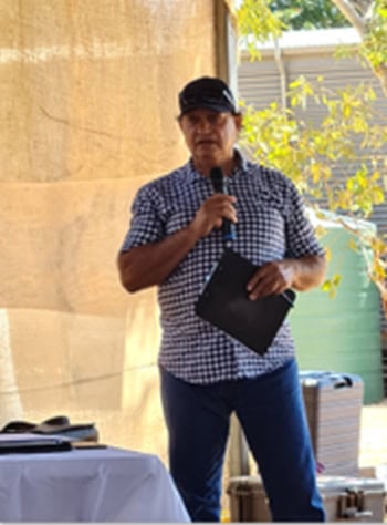 Colin saltmere holding microphone and talking