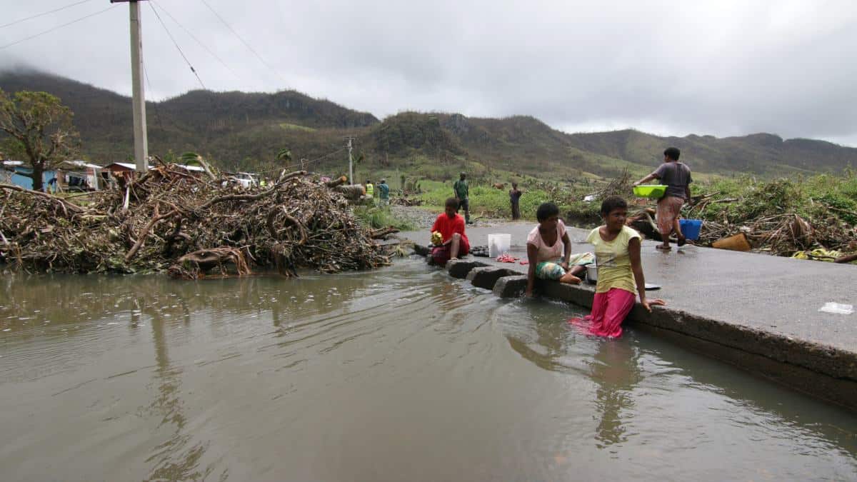 People inspect the damage at nokonoko settlement on february 26, 2016, caused by cyclone winston which devastated fiji.