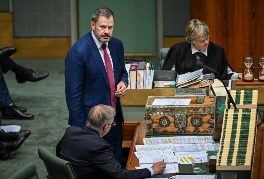 Ed husic in parliament next to speaker and anthony albanese