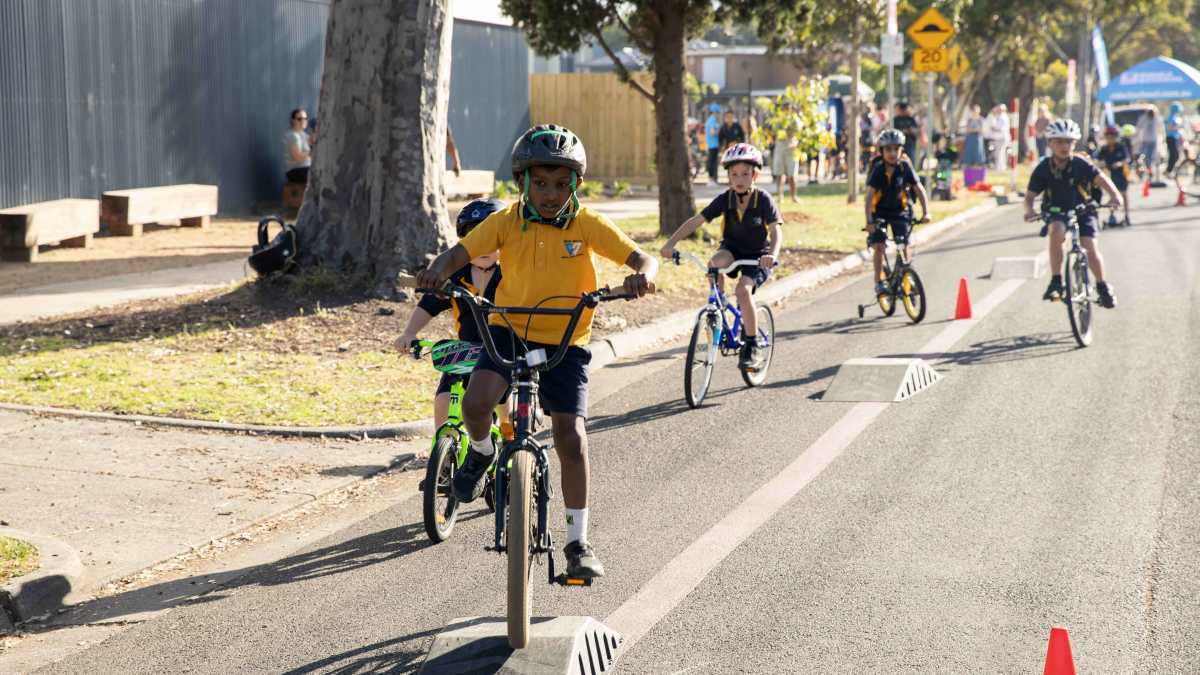 Children ride bikes to school