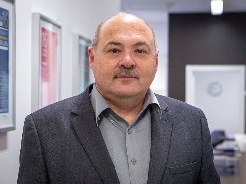 Tim marchant in the office.