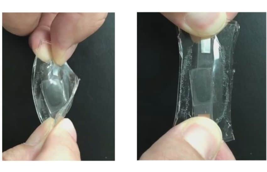 Two images of small clear battery being held and stretched in between two fingers