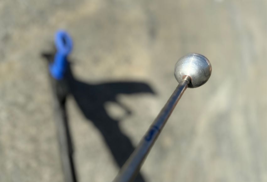 Metal pole with sphere on the end