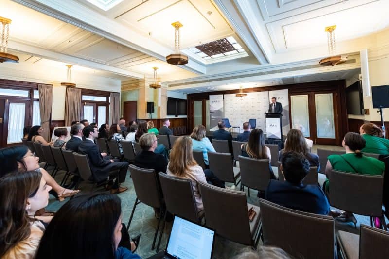People listening at the old parliament house venue, view from back of the room