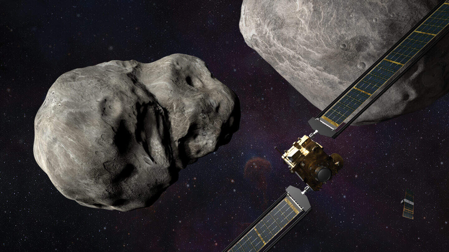 Two asteroid system with dart spacecraft.