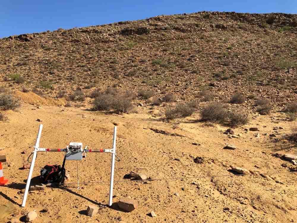 Arid africa with survey equipment