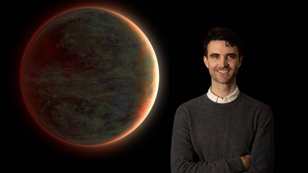 A man with planet on black background