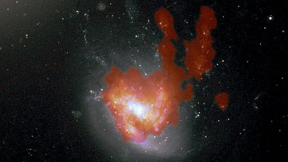 Jellyfish and bunny ear galaxy in orange