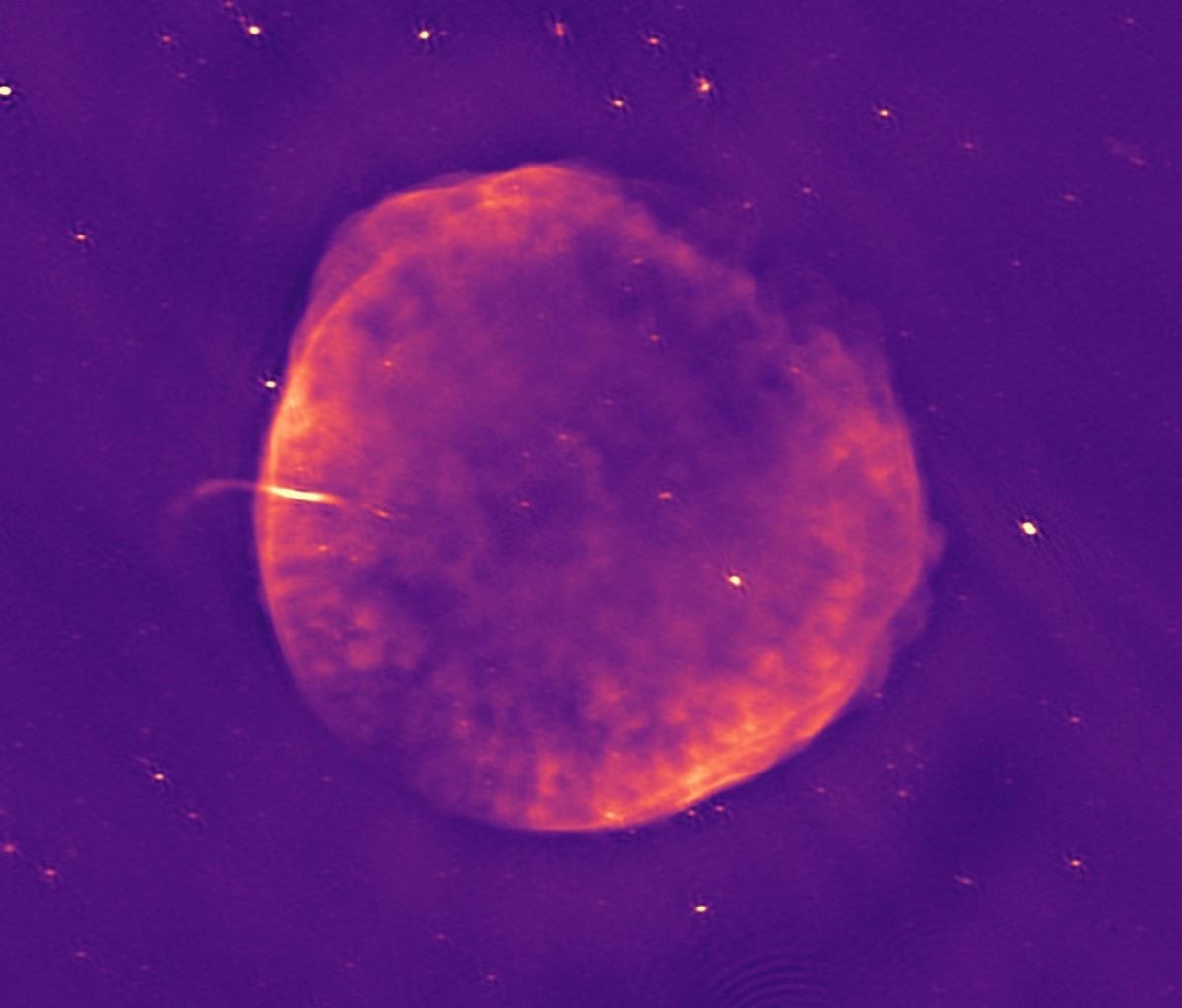 Pinky purple circular shape on a purple background