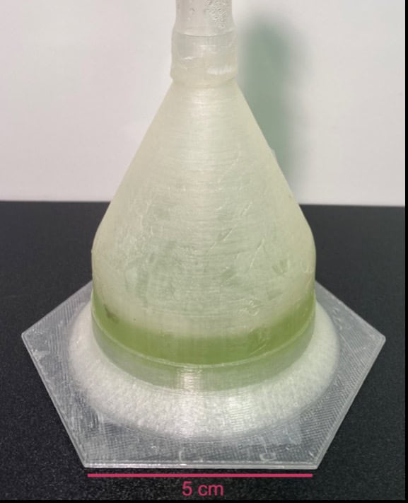 Cone shaped bioplastic habitat with algae