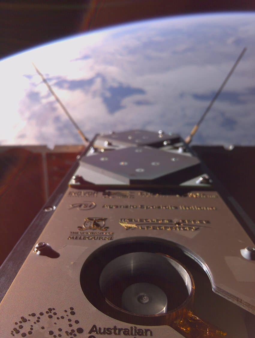 A selfie photograph of a satellite showing its perspective looking down on earth