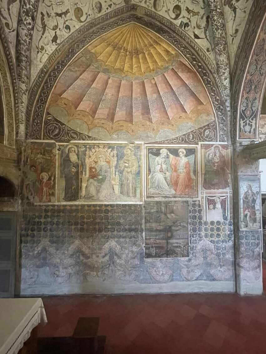 Wall of church showing painted fresco