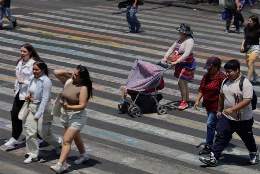 Young people crossing street