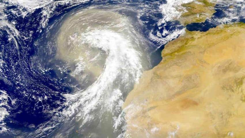 A map of north africa and the nearby atlantic ocean. A large plume of dust swirls away from the sahara desert and over the ocean.