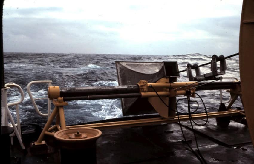 A photograph taken off the back of a ship, showing the grey ocean