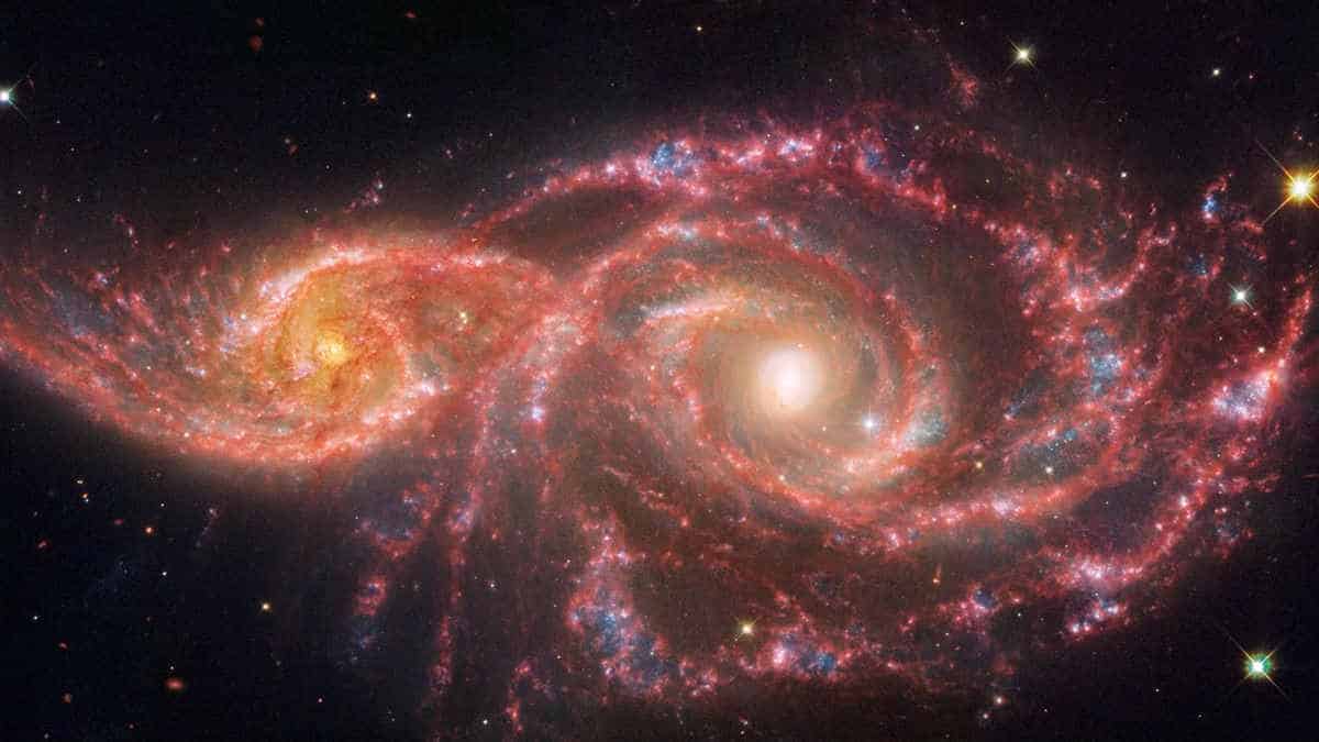 Bright red galaxies colliding look like eyes