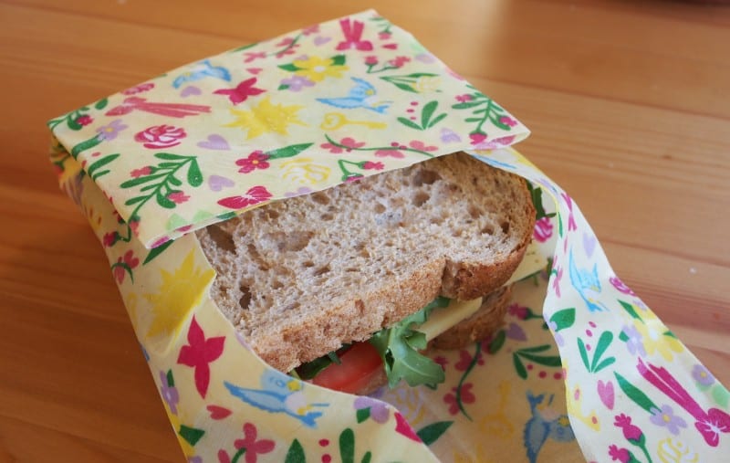 Colourful, waxy fabric around a sandwich. Beeswax wraps are one of the hands-on activities