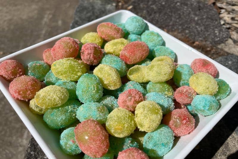 Rainbow coloured grapes in a bowl. One of the hands-on activities