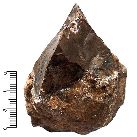 Stone tool on white background