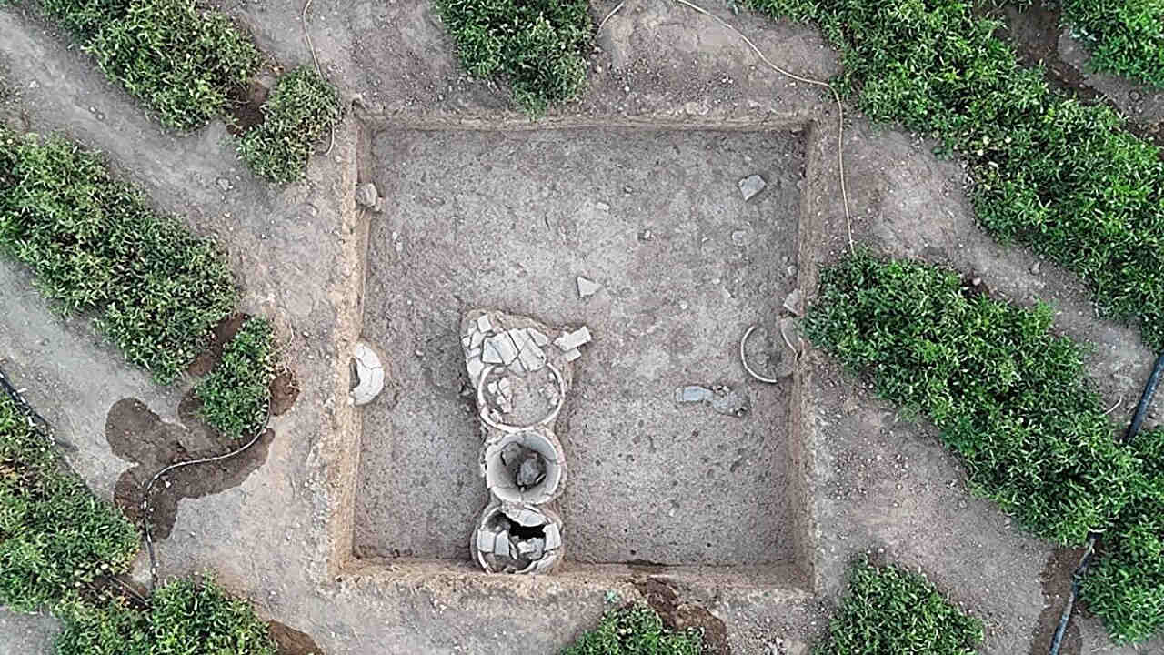 Aerial view of pots in archaeological site