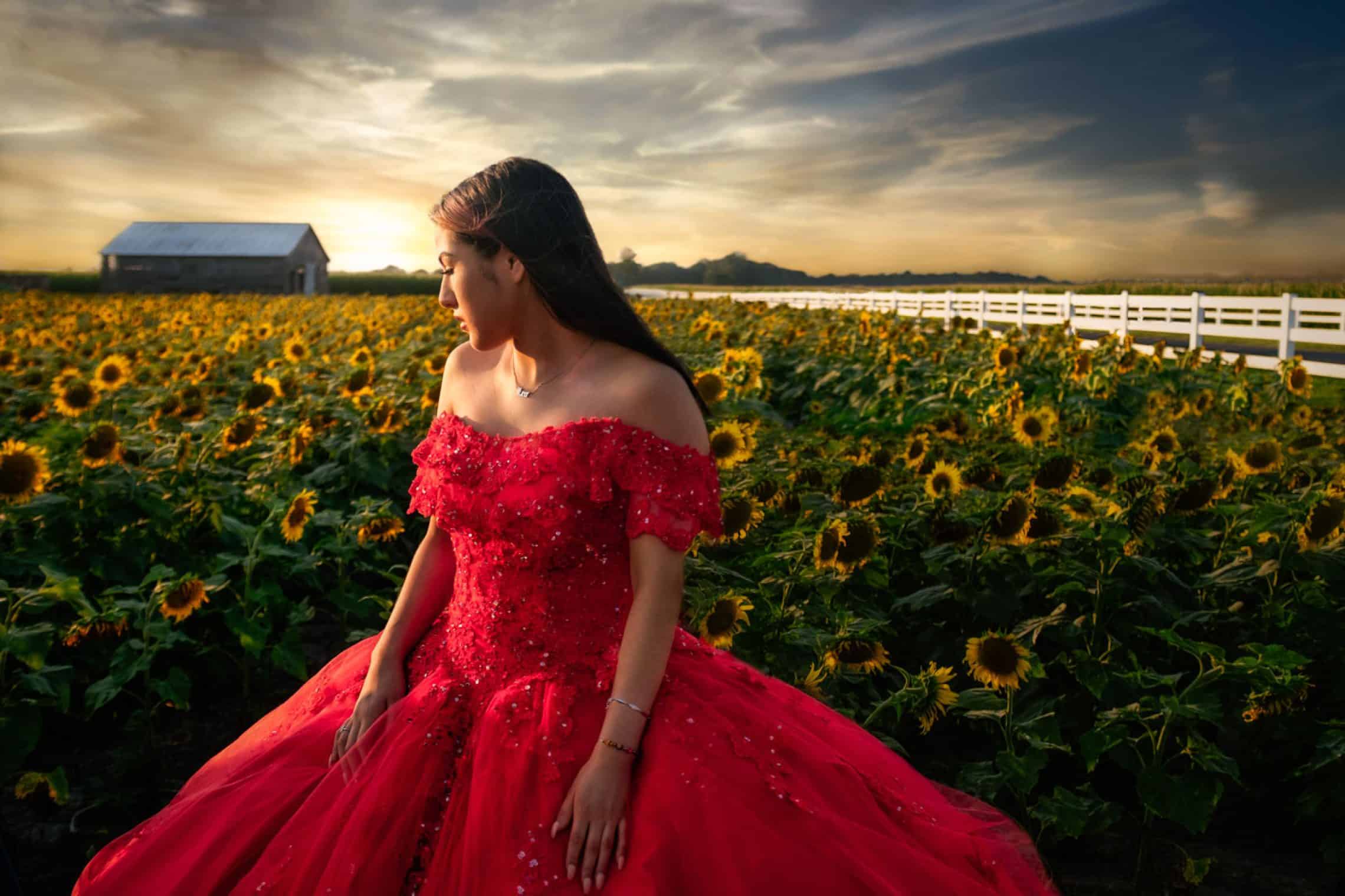 young woman in a field of sunflowers