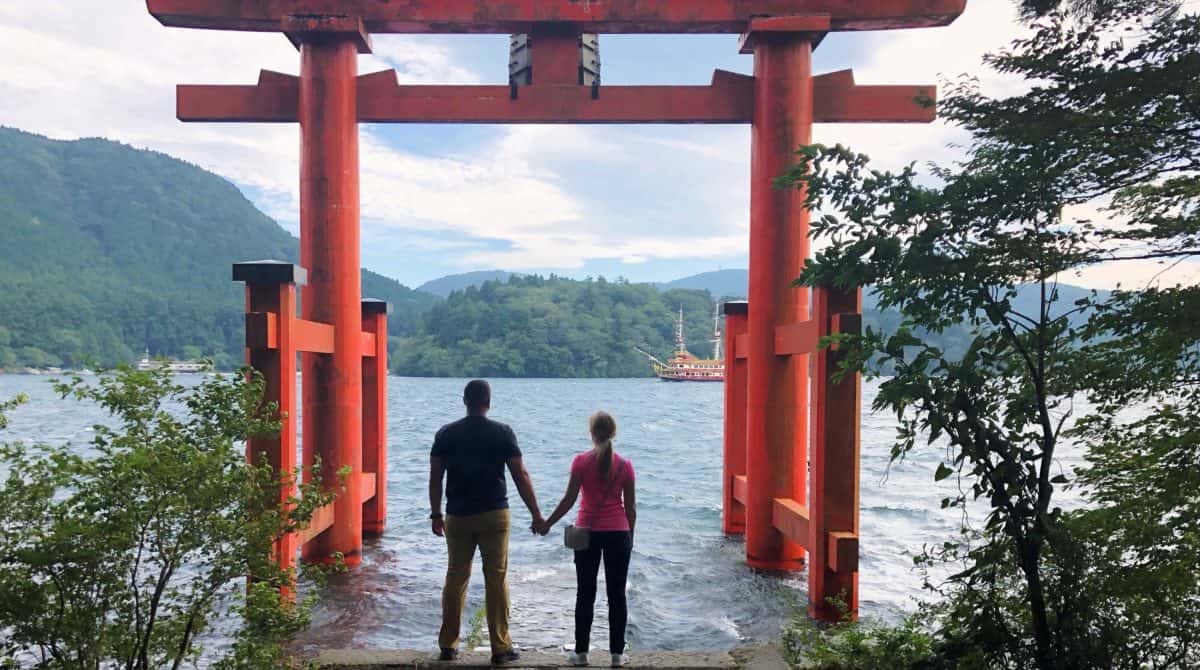 Standing in front of the torii gates in Japan