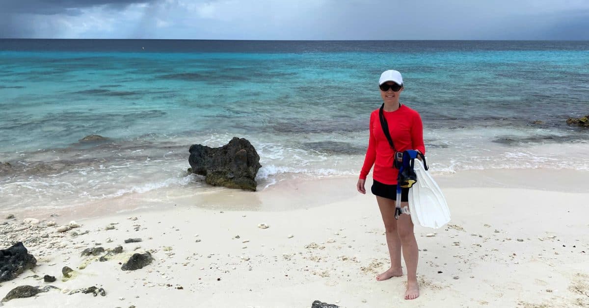 Wearing a pink Coolibar rash guard at Angel City Bonaire (1)