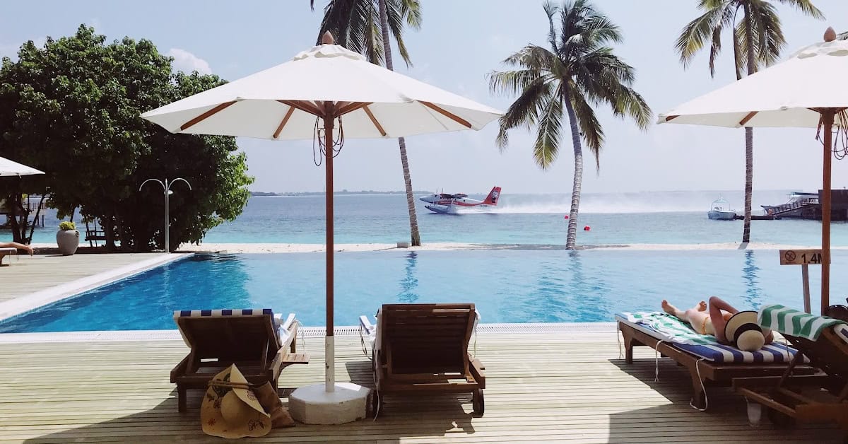 Watching a seaplane takeoff at Reethi Faru Resort