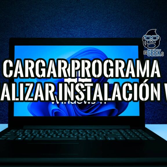 Portátil con la pantalla de inicio de Windows 11, con texto superpuesto que indica un truco para cargar un programa al final de la instalación.