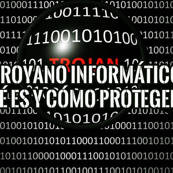 Lupa sobre código binario mostrando la palabra "TROJAN" en rojo, con el texto superpuesto "TROYANO INFORMÁTICO QUÉ ES Y CÓMO PROTEGERTE", representando una amenaza de malware.