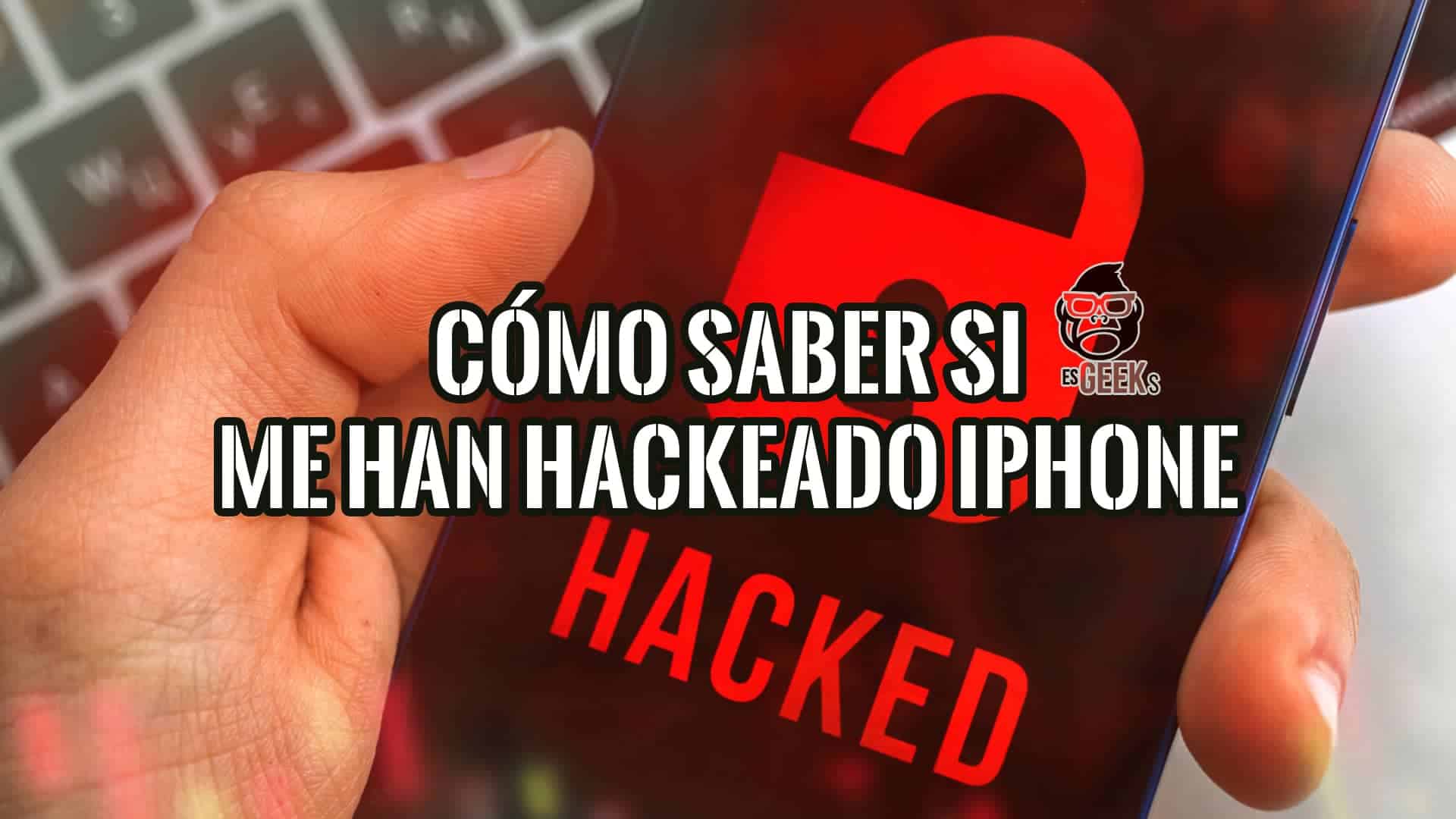 Una mano sujetando un iPhone con la palabra "HACKED" en rojo sobre una pantalla oscura. En la parte superior, se lee "Cómo saber si me han hackeado el iPhone".