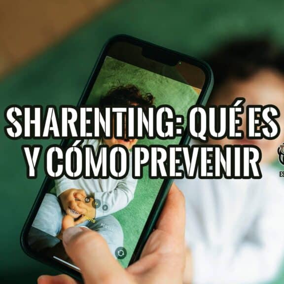 Una mano sostiene un teléfono mostrando una foto de un bebé sonriente. En la imagen se superpone el texto "Sharenting: Qué es y cómo prevenir riesgos".