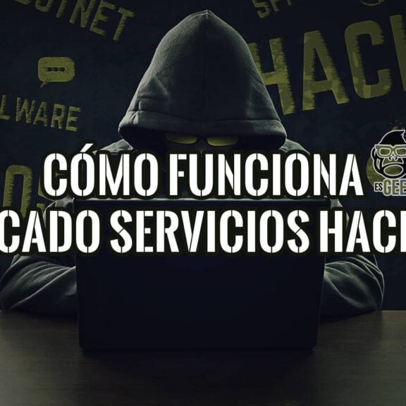 Hacker con portátil en un entorno oscuro. Guía sobre cómo contratar a un hacker y el mercado de servicios de hacking.