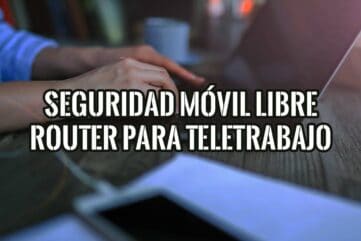 Persona teletrabajando en un portátil con el móvil sobre la mesa para usarlo como router de forma segura