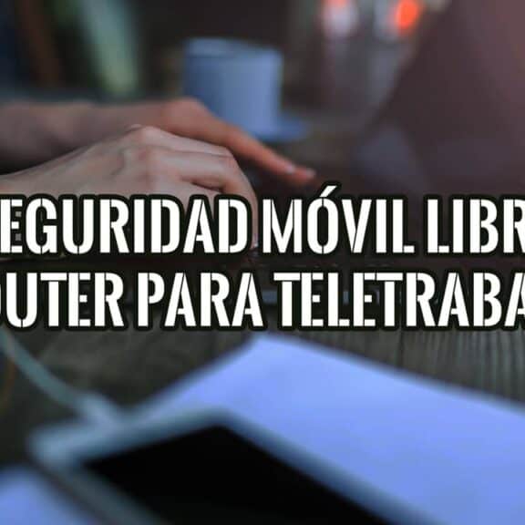 Persona teletrabajando en un portátil con el móvil sobre la mesa para usarlo como router de forma segura