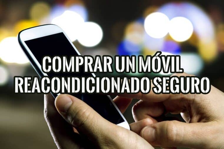 Manos sosteniendo un móvil de noche, sobre cómo comprar un móvil reacondicionado seguro