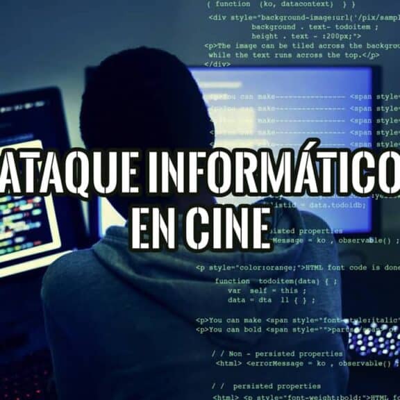 Hacker encapuchado frente a varias pantallas con código, el cliché del ataque informático en el cine