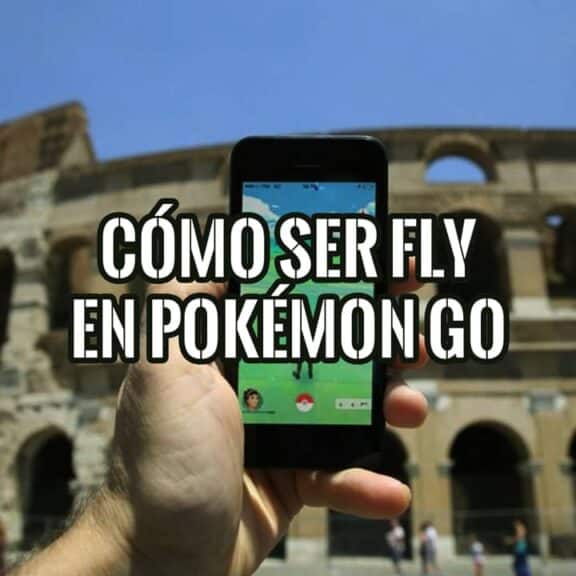 Mano con un móvil jugando a Pokémon GO frente al Coliseo de Roma, con el texto «Cómo ser fly en Pokémon GO»